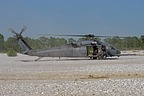 HH-60G ready to take off from the stony dry bed of the Tagliamento river after having us disembarked for taking pictures of the training activity with and without hoist device