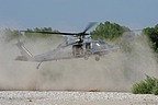 HH-60G approaching to the stony and sandy dry bed of the river, after concluding simulation of personnel recovery