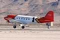 Originally built as C-47A in 1944, U.S. Forest Service Basler BT-67 conversion returning after dropping the USAFA team.