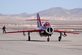 Bill Reesman waiving at the crowds from his MiG-17