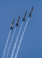 Blue Angels fourship into the blue sky