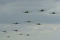 Spitfires, Hurricane, and Buchons against a pitiful sky