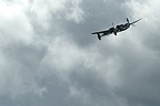 P-38 Lightning climbing away into the clouds
