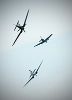 Battle of Britain re-enactment, Spitfire tail-chasing the Buch�n