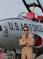 Pilot Greg 'Wired' Colyer posing in front of the Acemaker Airshows T-33