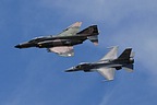 F-16C Fighting Falcon and QF-4E Phantom II formation
