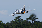 The MiG-17 afterburner giving the Black Diamond display some color 