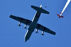 U.S. SOCOM Para-Commandos jumping from RI ANG 143rd AW C-130J