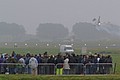 A general impression of the conditions as the Royal Netherlands Air Force display F-16AM, J-055,  from 311 Squadron takes off into the murk.