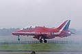 BAe Hawk T.1W, XX292, of the Royal Air Force Aerobatic Team - The Red Arrows lands through the smoke of other team member after displaying.