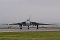 Held back waiting for better weather Avro Vulcan B.2 , XH558, about to turn onto the western end of the runway in the best sunlight of the day ..