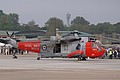 Westland Sea King HU.5 SAR, PW-707/XZ920, from HMS Gannet Search and Rescue Flight catches a brief glimpse of late afternoon sunshine.