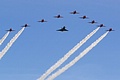 The Red Arrows in formation with the Typhoon Solo Display Team Eurofighter Typhoon FGR.4 before beginning their display.