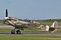 317 (Polish) Squadron Spitfire Vb BM597/JH-C returns after displaying with fellow Historic Aircraft Collection Hurricane prior to the Sunset Ceremony.