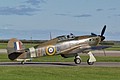 Historic Aircraft Collection Hurricane XIIa X5140 wearing the HA-C codes of 126 Squadron taxies out to display with the HAC Spitfire.