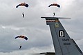 How would that be for a spot landing ?  ...some members of the  RAF Falcons Parachute Display Team come into land.