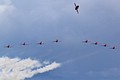 Team Leader 'Red 1' breaks off to lead the Royal Air Force Aerobatic Team the Red Arrows into a stream landing following their display.