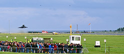 As the Tornado GR.4 Role Demo pair run in from behind the final 6 Squadron Typhoon lifts off well down the runway to go vertical