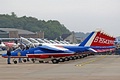 Patrouille de France lined up, crewed up, canopies still raised but about to start engines for their public display on Saturday