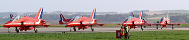 All seven aircraft from the 2012 Red Arrows team caught in the frame after displaying, the team will resume nine-ship displays in 2013