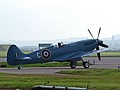 Rolls-Royce's Spitfire PR.XIX in the markings of the Central Photographic Reconnaissance Unit holds short of the runway