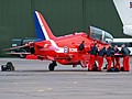Last minute team briefing for the Red Arrows before the pilots man their aircraft