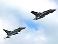617 Squadron Anniversary Tornado GR.4 and 1 Squadron Typhoon FGR.4 flypast in salute during the Sunset Ceremony
