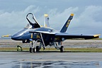 U.S. Navy Blue Angels F/A-18C Hornet as the clouds pulls away after the morning rain