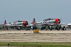 GEICO Skytypers' classic T-6 trainers taking off