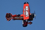 Seeing a prop-driven bi-plane while hearing the screaming jet noise