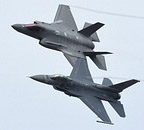 F-16 Viper Demo and F-35A Lightning II in tight formation