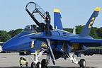 USN Blue Angels ground crew member making sure #2's canopy is spotless
