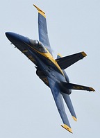 Conditions were not humid enough for the big vapor condensation trails usually seen when the Blue Angels fly the low altitude routine.