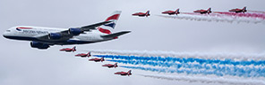 British Airways Airbus A380 joined by the RAF Red Arrows