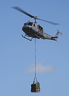 RNZAF UH-1H transporting cargo