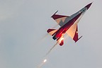 RSAF Black Knights' F-16C lit up by its flares