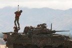 Winching onto a moving NZLAV from the Armys Queen Alexandra's Mounted Rifles