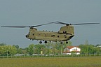 The CH-47F, serial #16-08201, in hovering while waiting for the couple of UH-60Ms. These helis departed to the Maniago range to support the day's training activities of the 173rd Airborne Brigade parachutists