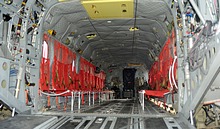 The inner close up of a Chinook in configuration for airborne troops