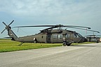 The Black Hawk #11-20420 parked on south side of the taxiway