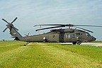 The Black Hawk #11-20420 parked on south side of the taxiway