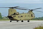 The CH-47F, serial #16-08201, is taxiing towards the take off point on the runway
