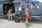 Maintainer from 56th Helicopter Maintenance Unit (HMU) begins to remove all covers from the HH-60G and flight engineer reads the scheduled flight plan
