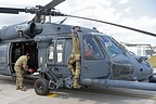 Maintainer removes all covers from the HH-60G