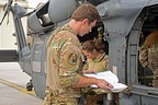 The flight commander reads the scheduled flight plan