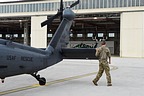 Flight commander performs the walk -round with a visual check of the aircraft