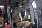 Flight engineer sitting on her seat is waiting for engine start