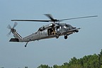 HH-60G approaching to the stony and sandy dry bed of the river, after concluding simulation of personnel recovery