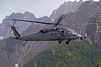 Approach to the narrow grassy strip. Flight engineer and gunner assist pilots in identifying any kind of obstacle during approach operation