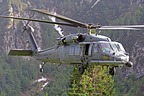 The 56th RQS HH-60G approaching to the grassy strip to simulate a personnel recovery with the hoist